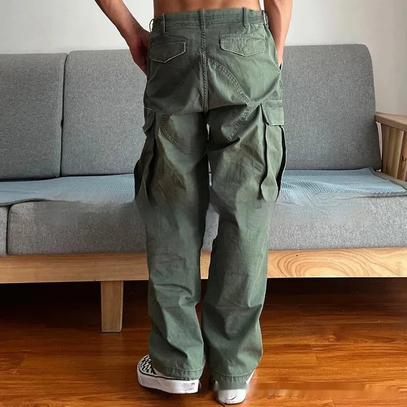 Men's loose cotton paratrooper trousers in Army Green with mid rise zipper fly
