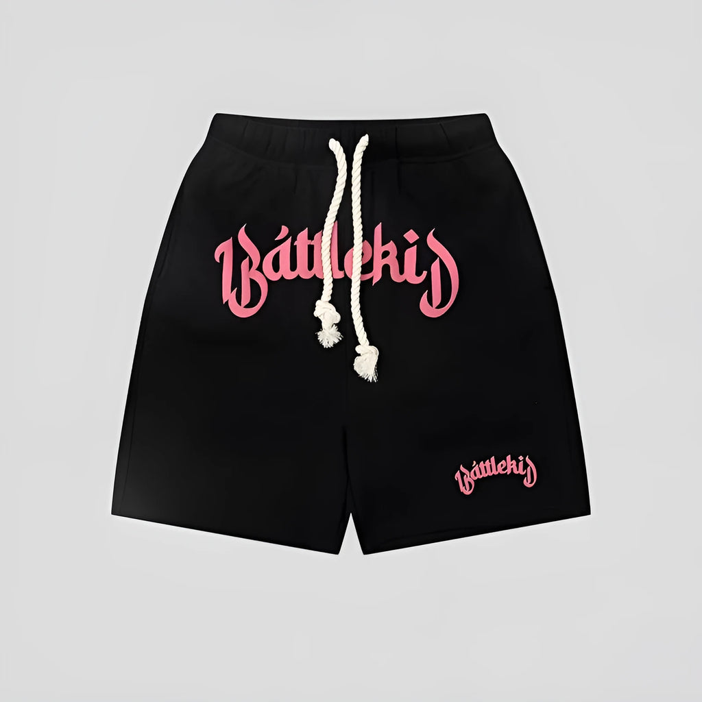 Men's loose grey cotton blend hip hop shorts with a cropped, street-style design on a neutral background.
