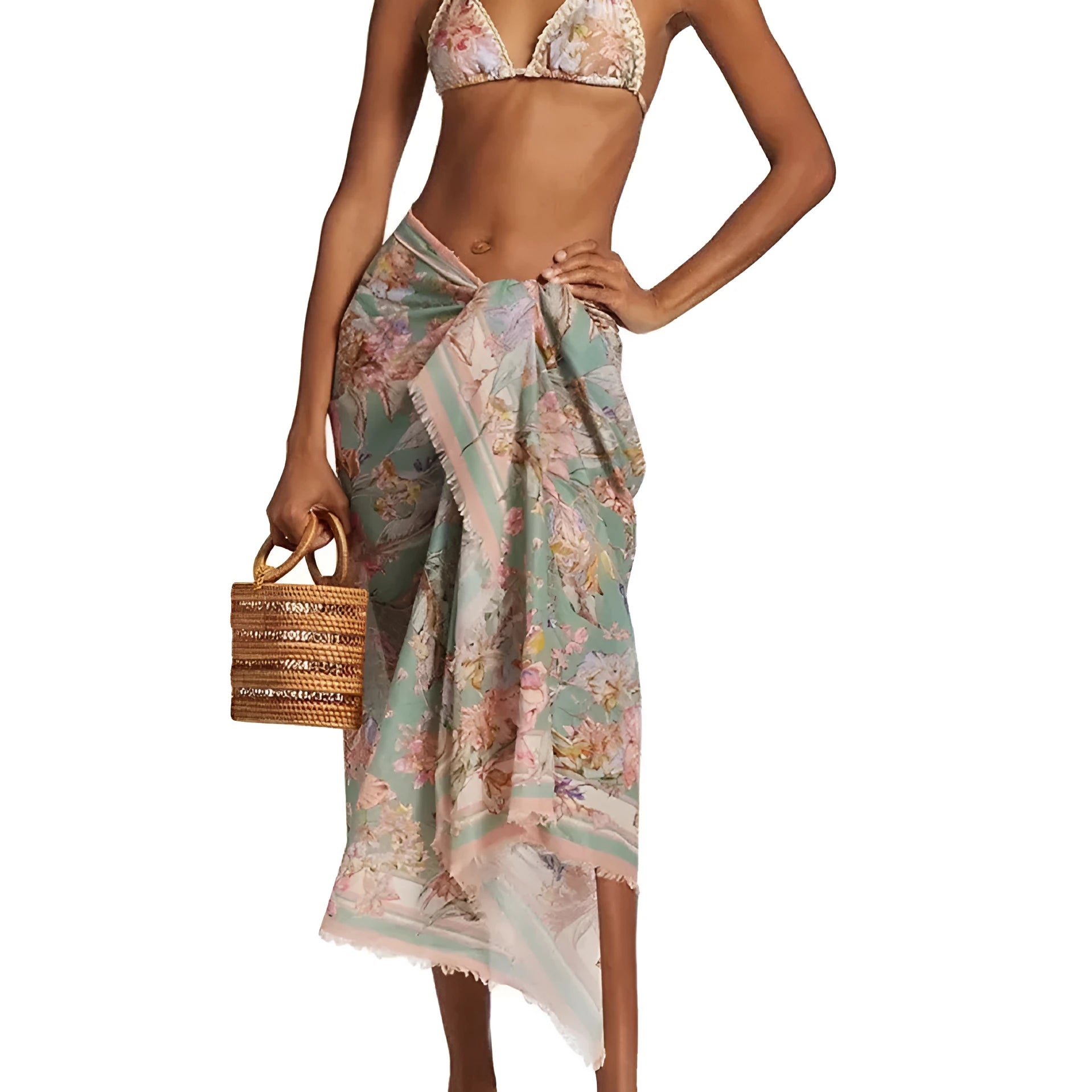 Creamy white floral print women's bikini set with matching skirt on a mannequin.