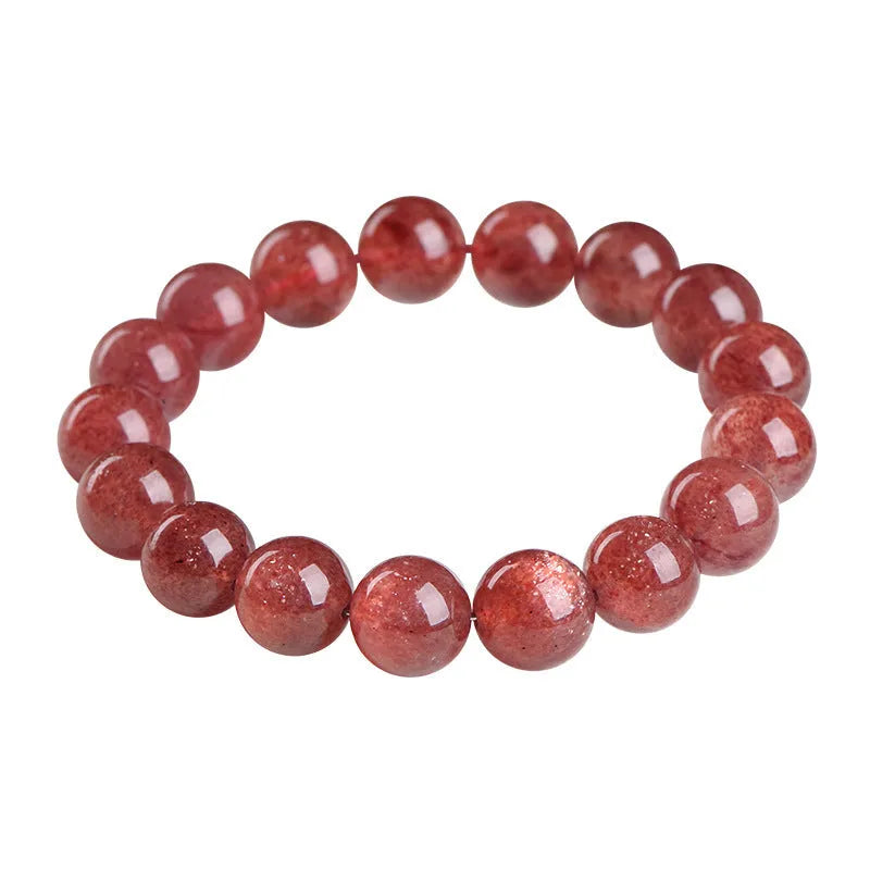 Natural strawberry quartz crystal bracelet with geometric beads showing starry inclusions