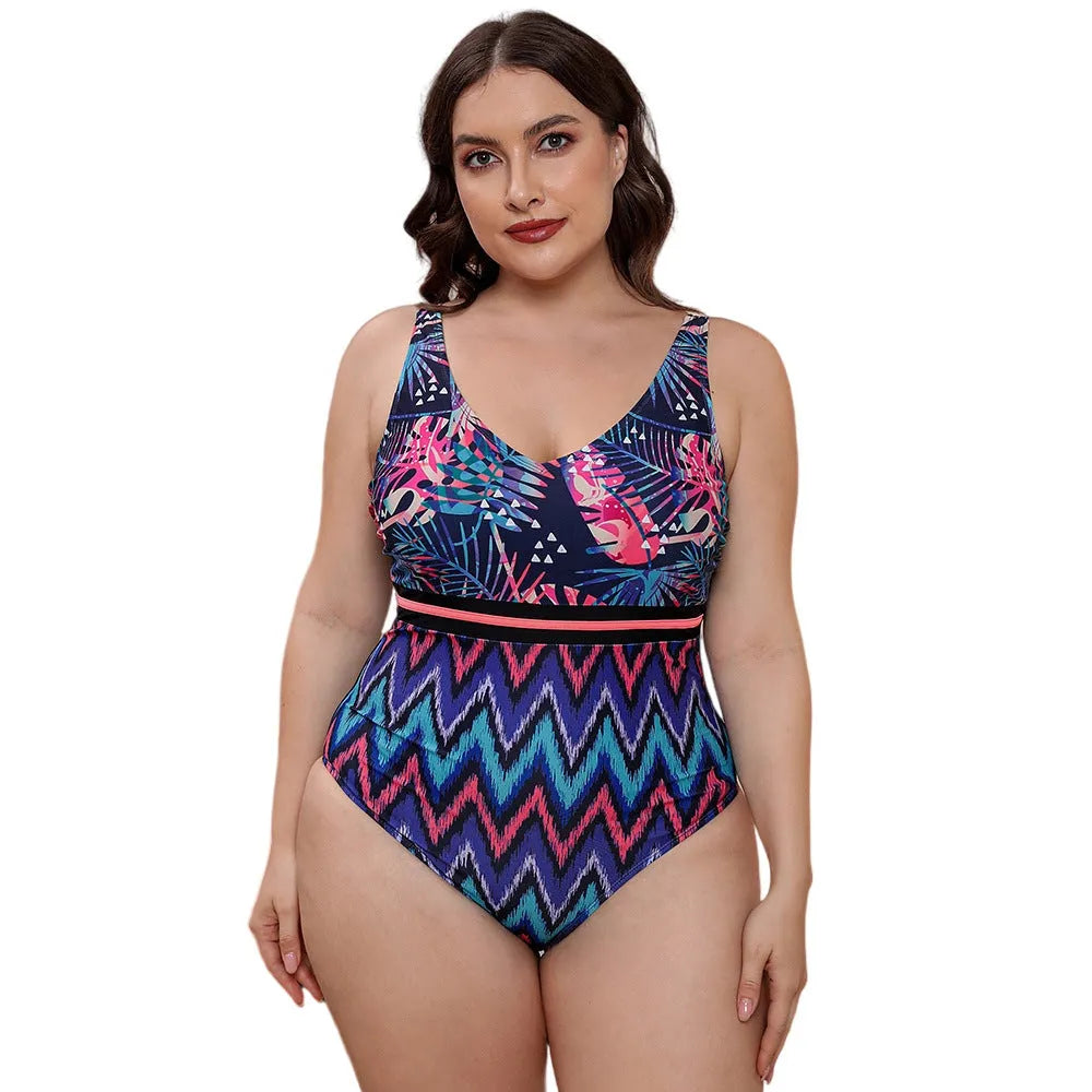 Women's one-piece striped spaghetti strap swimsuit with printed patterns in blue, white, and green options.