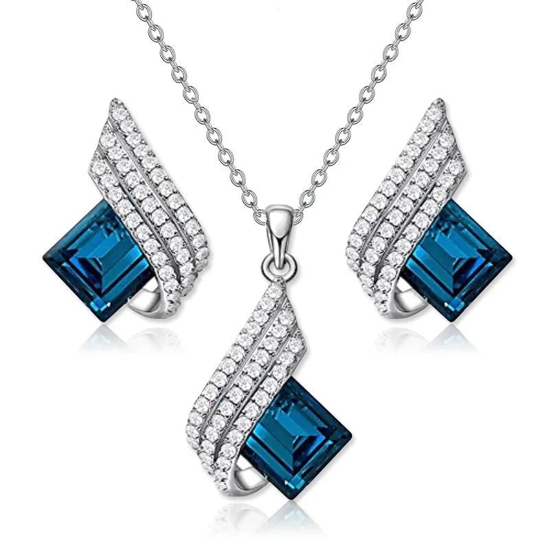 Glass pendant necklace with cross chain and matching electroplated alloy ear studs jewellery set
