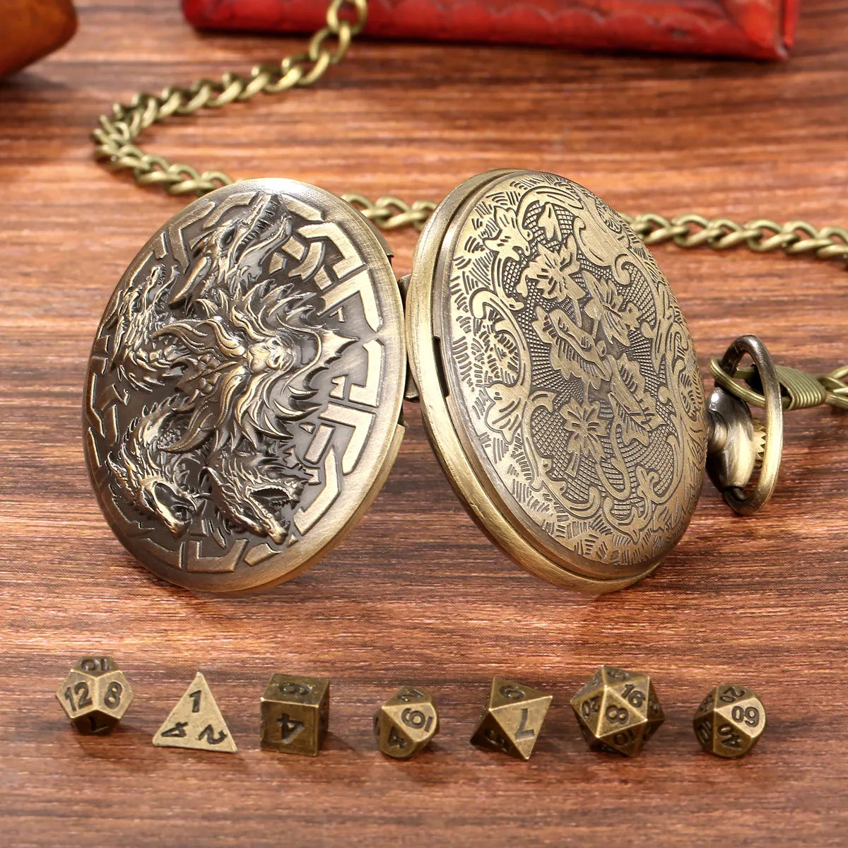 Steampunk pocket watch shaped dice set open revealing 7 polyhedral dice in zinc alloy bronze finish on dark background
