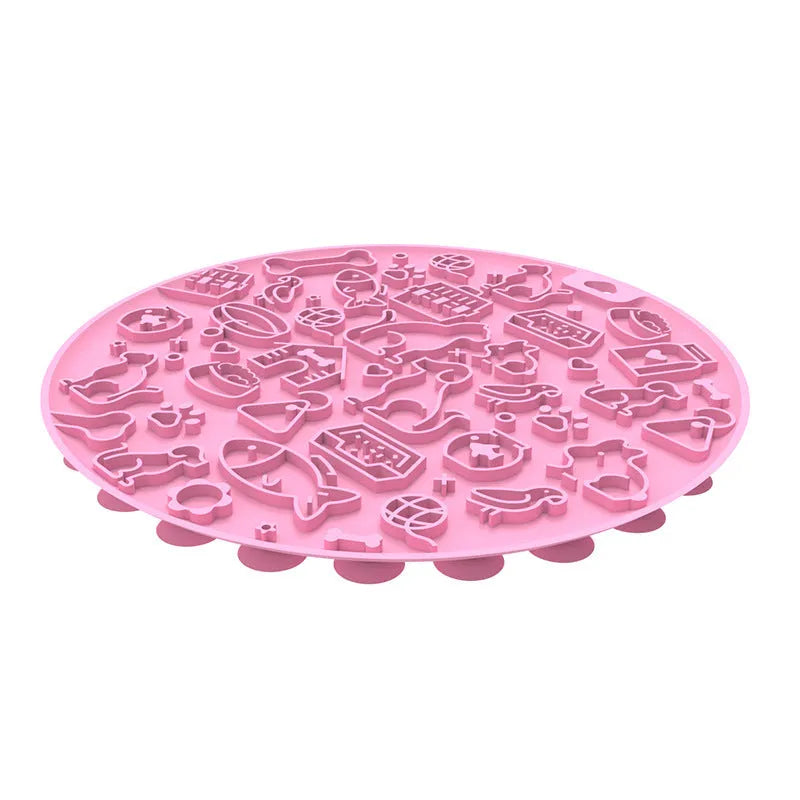 Round silicone pet lick mat with suction base in blue colour on tiled surface