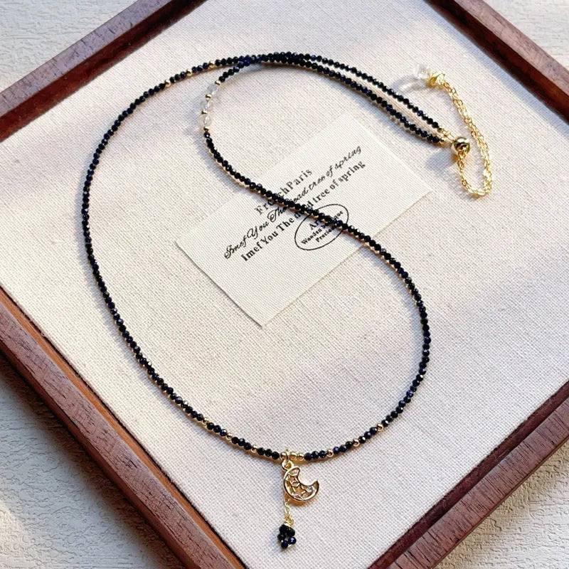 Women's three-ring layered bracelet with blue sand stone beads and gold-toned metal components