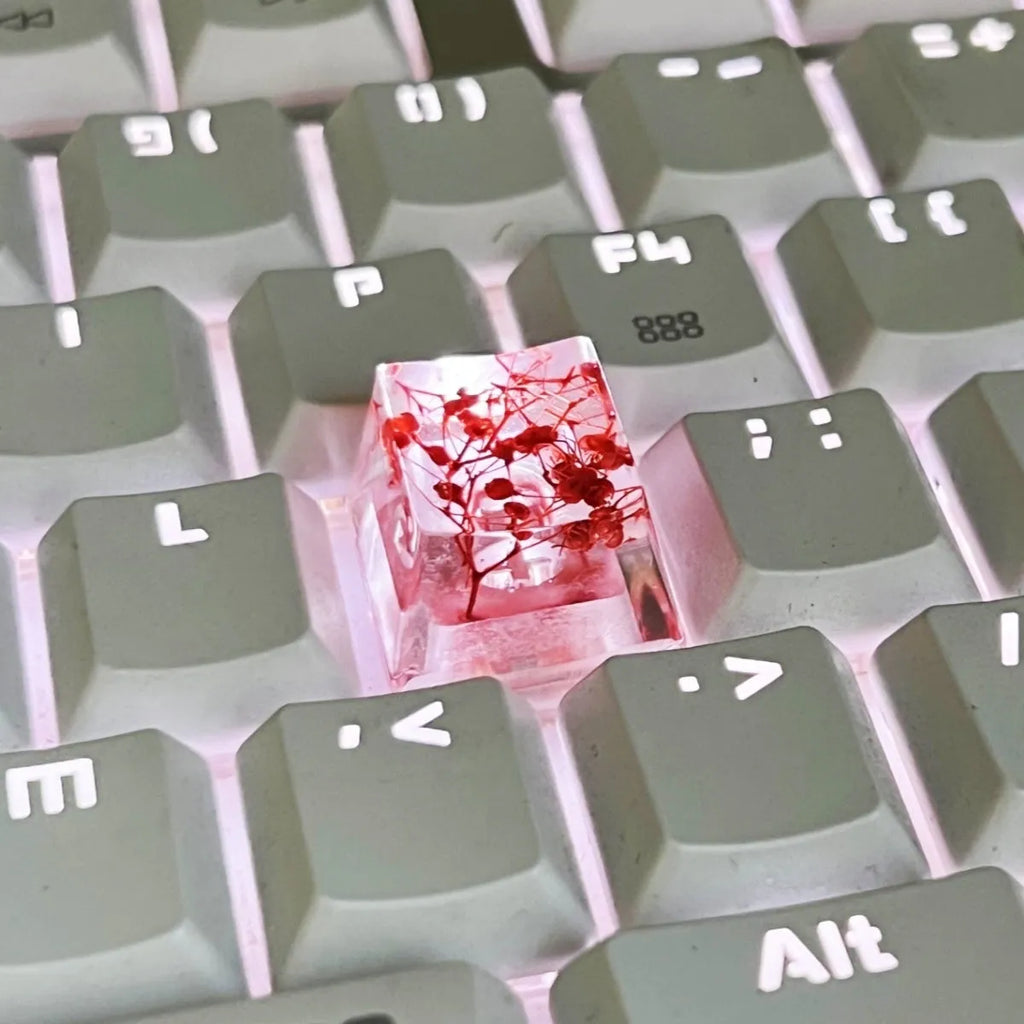 High transparency resin mechanical keyboard keycap with starry sky design in one of four colours.
