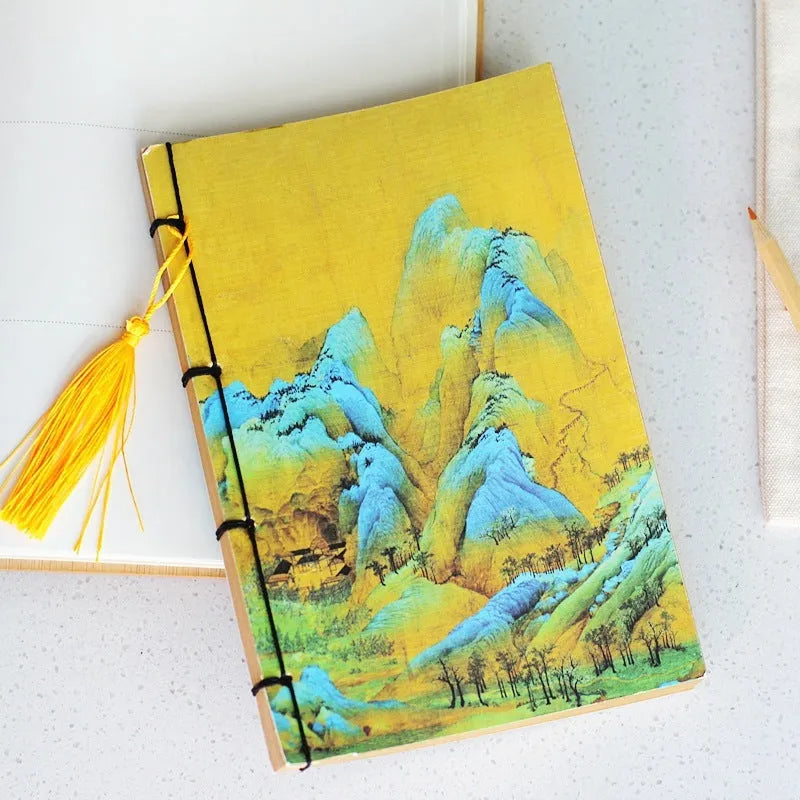 A5 antique thread-bound notebook with embossed cover and decorative tassels