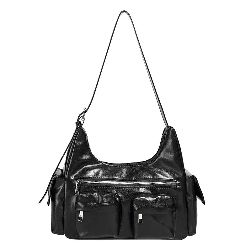 Black PU leather shoulder motorcycle bag with sewing line details against a plain background