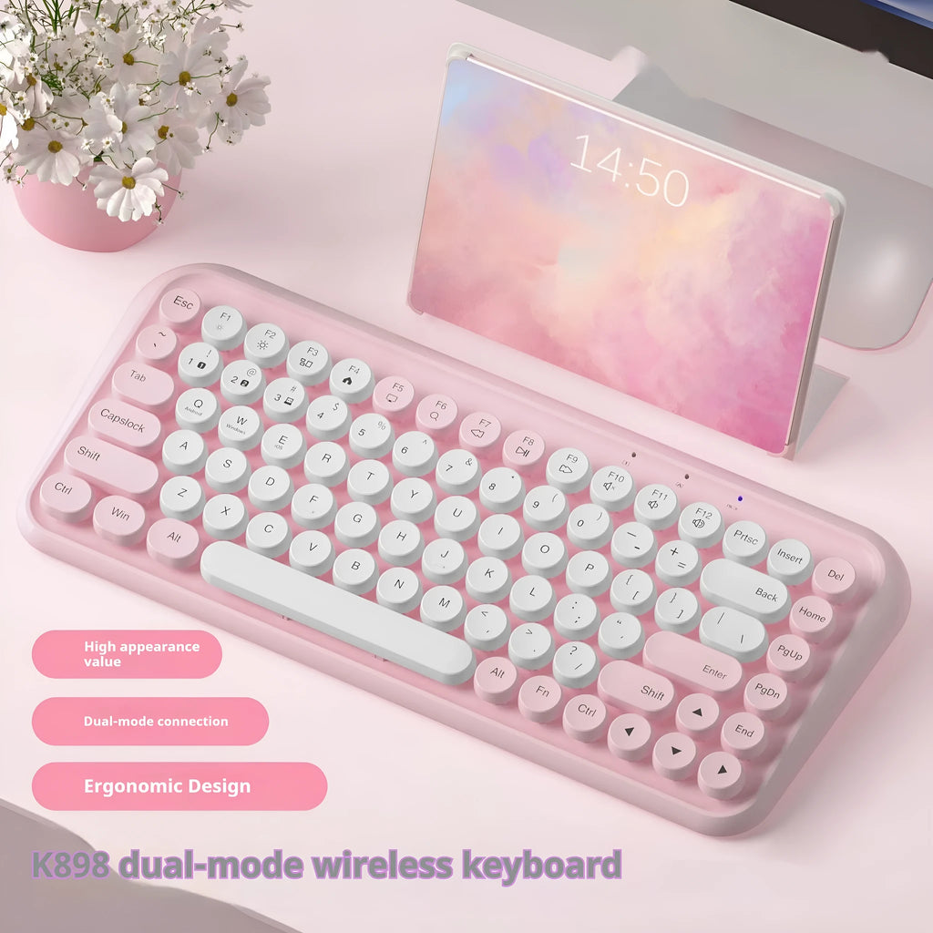 Pink portable Bluetooth wireless keyboard with 84 keys and compact design