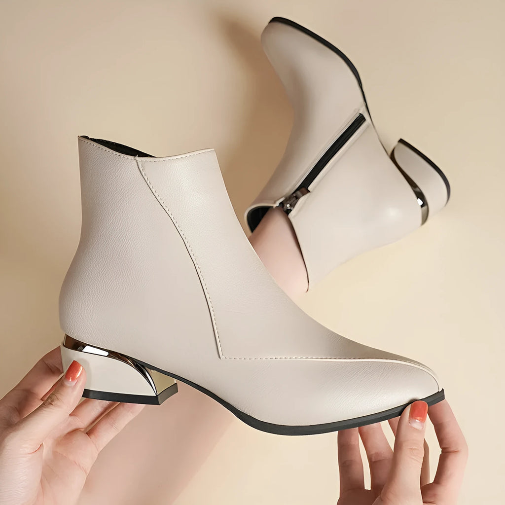 Women's chunky heel Martin boots in black with side zipper and leather stitch detail