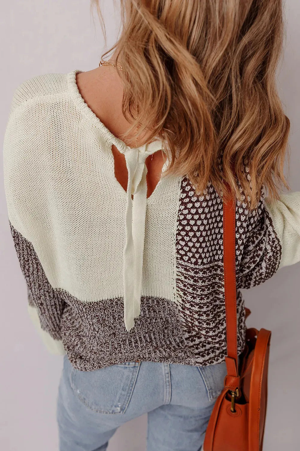 Dark khaki colour block women's sweater with drop shoulders and a back tie detail.