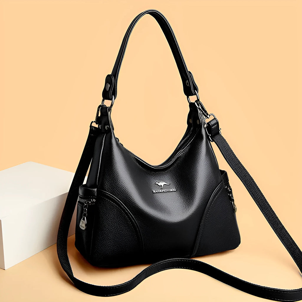 Women's soft PU leather messenger bag in beige with horizontal square shape and lined interior