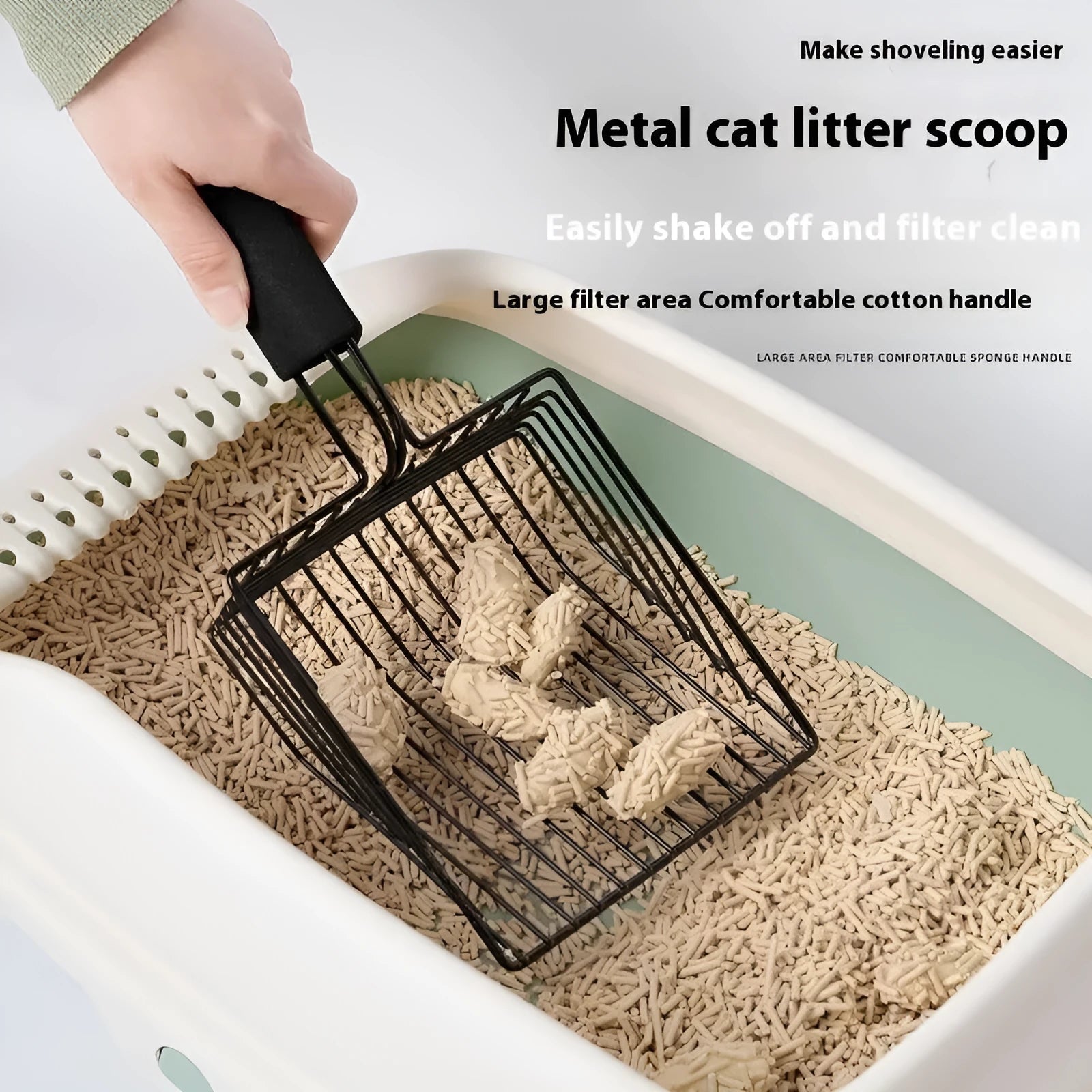 Black metal cat litter scoop with 0.8cm gap spacing between tines
