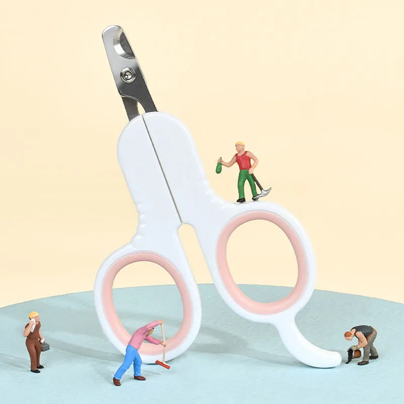 Professional grey pet nail clippers with curved stainless steel tips and a rubber-coated ergonomic handle.