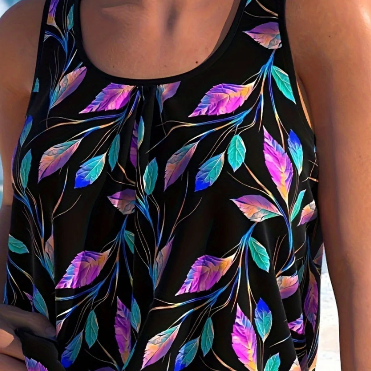 Women's leaf print two-piece swimsuit set in polyester fabric showing bikini top and matching shorts