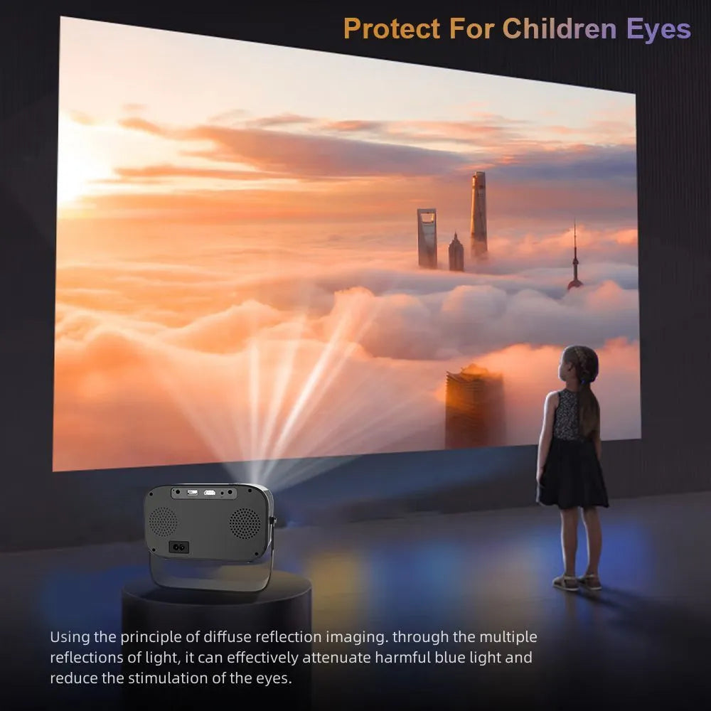 Black portable HD smart projector with remote control on table