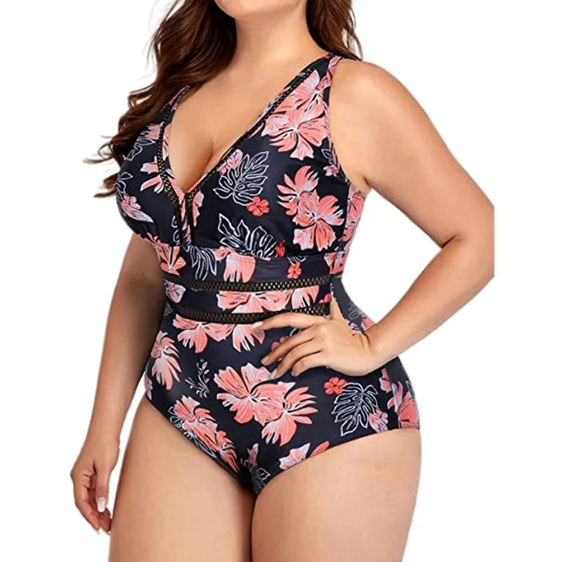 Black printed plus size women's bikini swimsuit with mesh stitching detail.