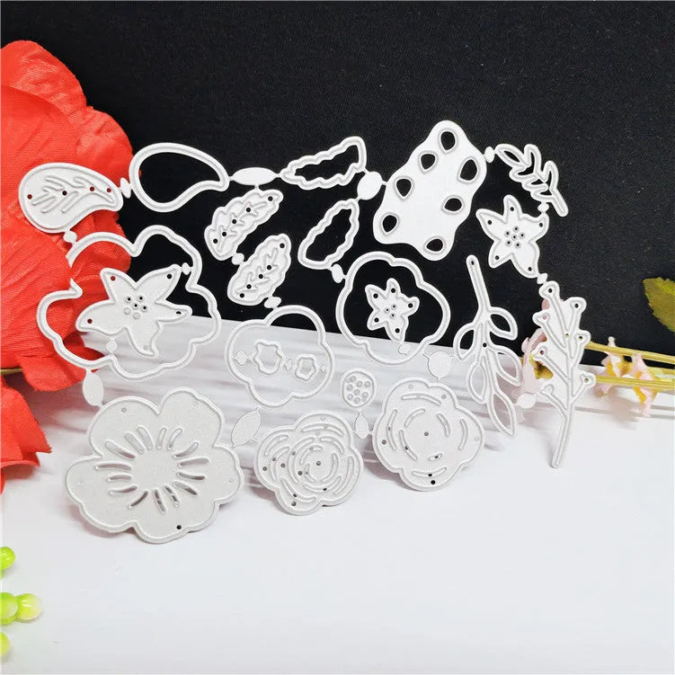 Silver carbon steel flower cutting die for papercraft measuring 14.3 by 9.9 centimetres