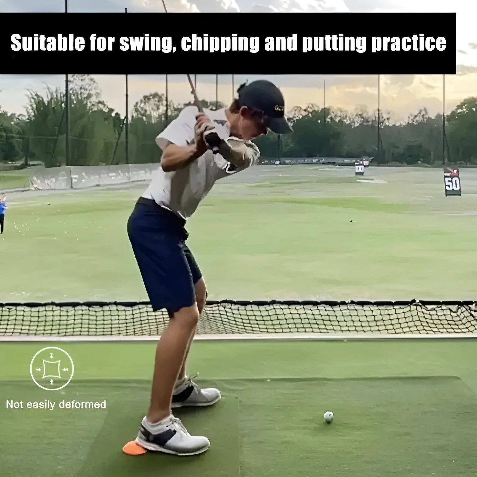 Orange golf training mat with centre of gravity zone for swing strength practice