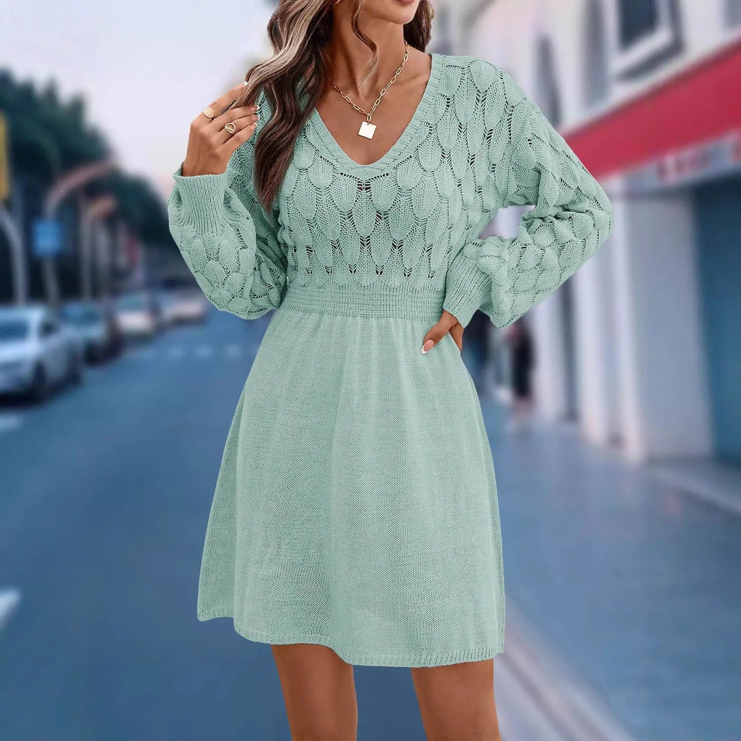 Long sleeve V-neck beach dress with high waist, midi skirt, and artistic 3D pattern in acrylic fabric.