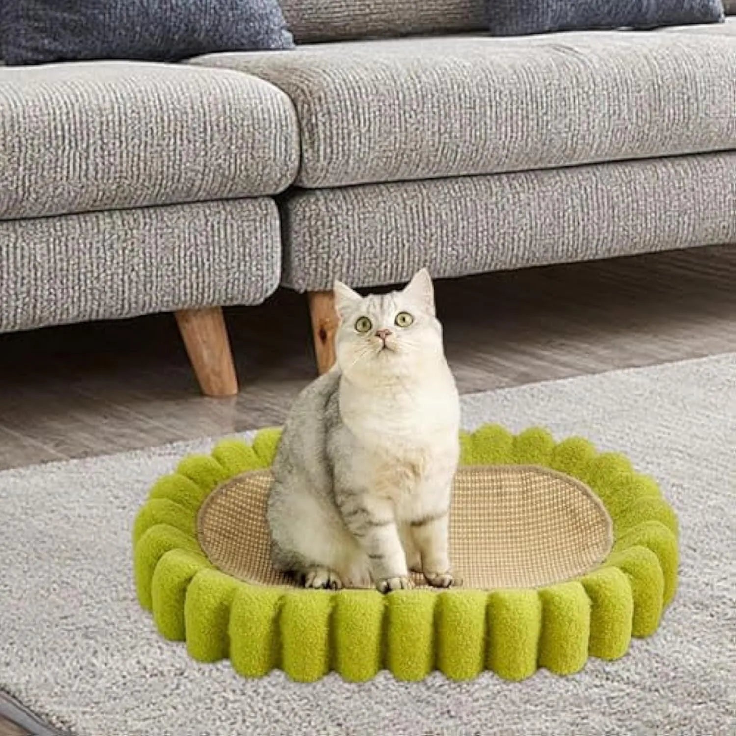 Green oval-shaped sisal cat scratching pad and lounger bed