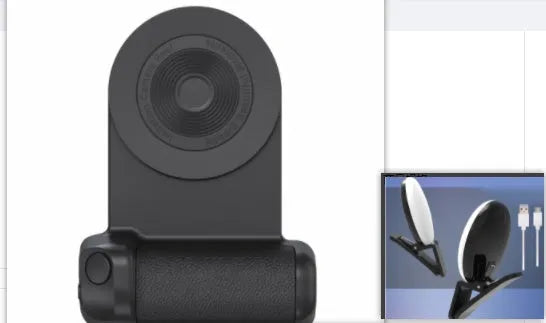 Black magnetic phone camera handle with rotatable design and PU leather grip on wooden table