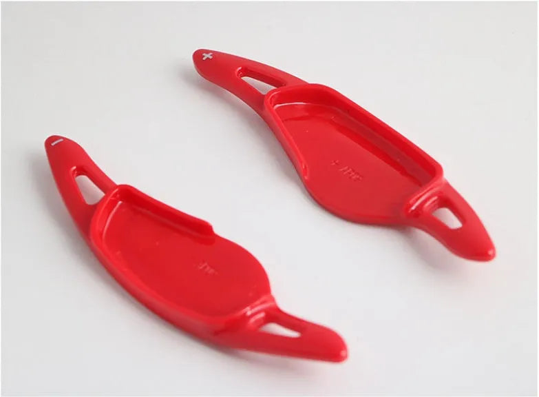 Carbon fibre pattern steering wheel paddle shift modification kit for car interior.