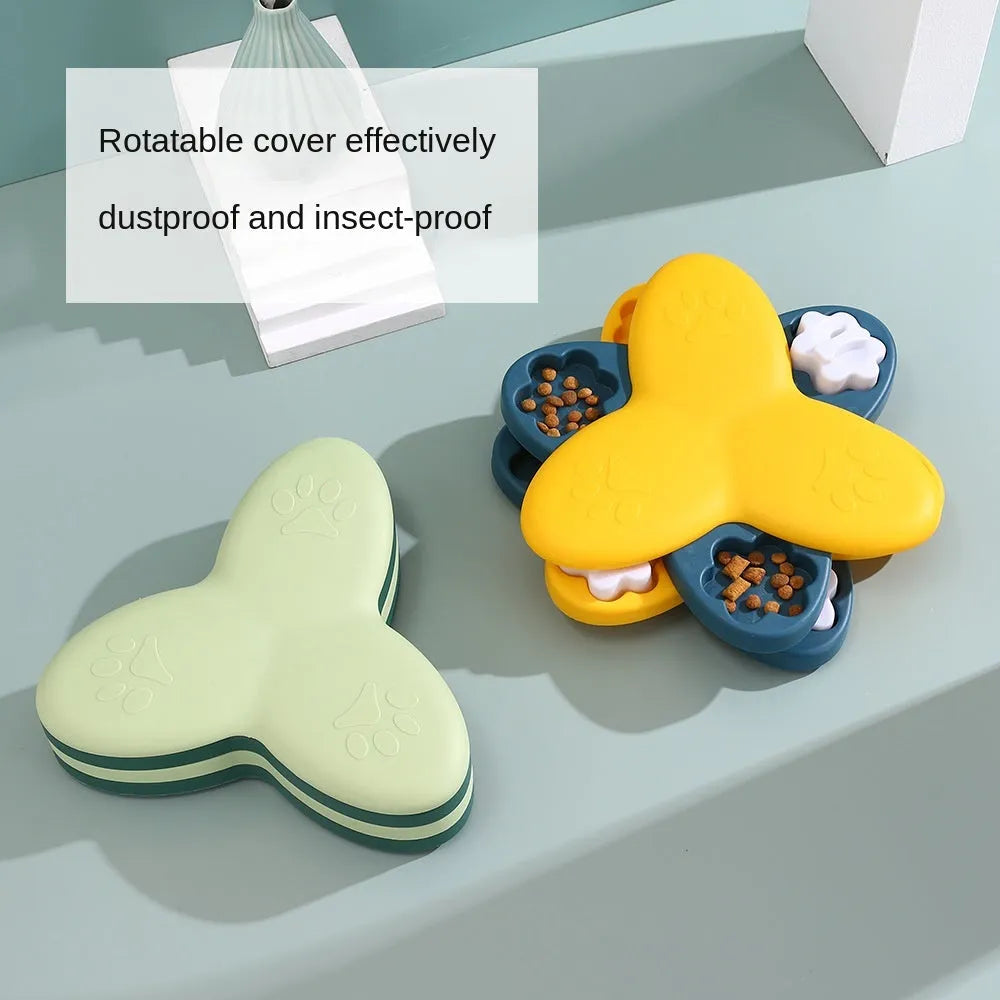 Green dog puzzle toy with bone-shaped covers showing nine compartments for treat dispensing