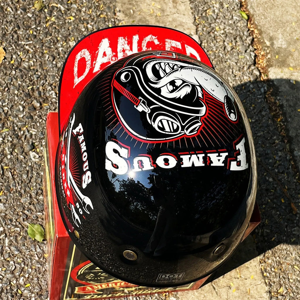 Black Witch full-face motorcycle helmet with blue lens and ABS shell