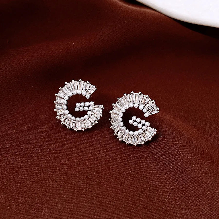 Silver alphabet letter earrings with imitation pearl and inlaid zircon for women light luxury fashion