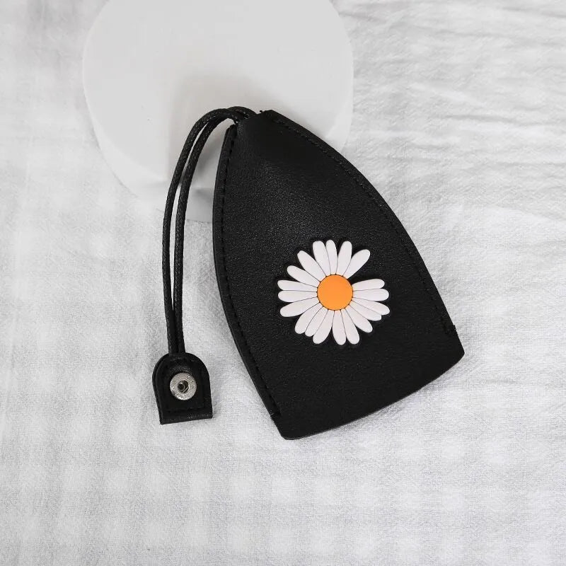 Cartoon design pull-out key case for car keys in PU leather.