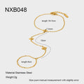 Gold stainless steel bracelet with eight pointed star and flower charms