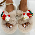 Women's Christmas hat slippers with hairy faux plush upper in black, shown from the side.