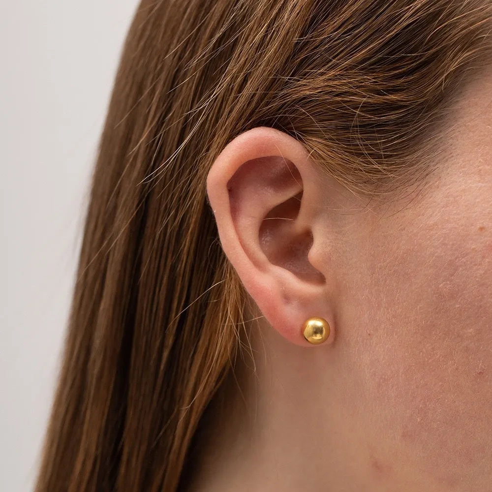 Stainless steel ball stud earrings with gold or silver plating in 3mm, 4mm, 5mm, and 6mm sizes