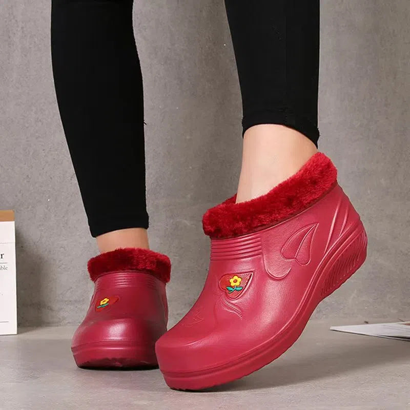 Unisex waterproof fleece-lined rain boots with anti-slip EVA sole in black, side view