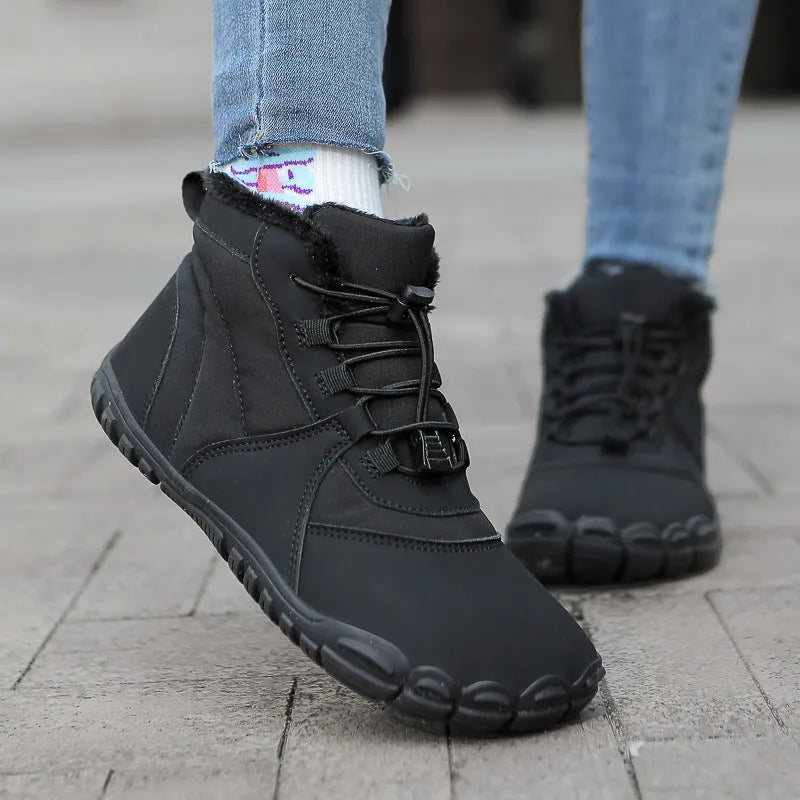 Waterproof fleece-lined unisex snow boots with rubber sole and lace-up front.