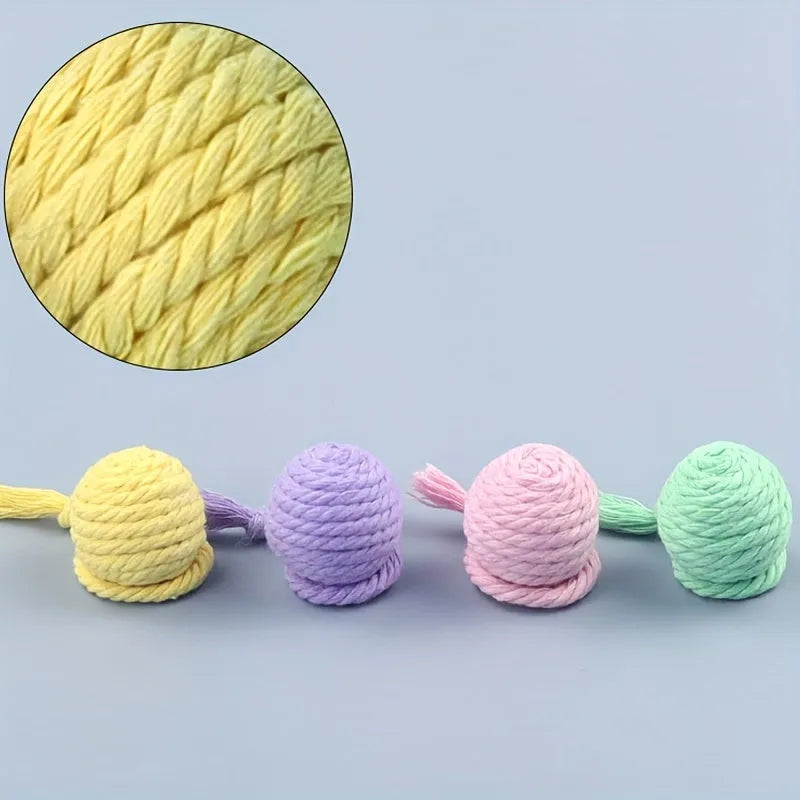Cat toy ball with rope and bell in green pink purple yellow colours showing 3cm and 6cm size options
