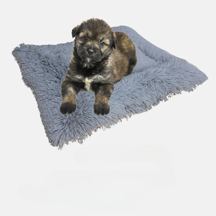 Grey pet warm pad with long plush hair and black non-slip bottom for cats and dogs