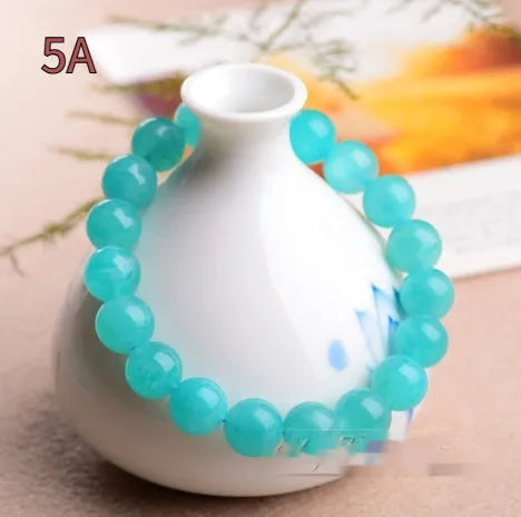 Grade 7A Amazonite natural scattered beads in blue-green ice colours with polished surfaces