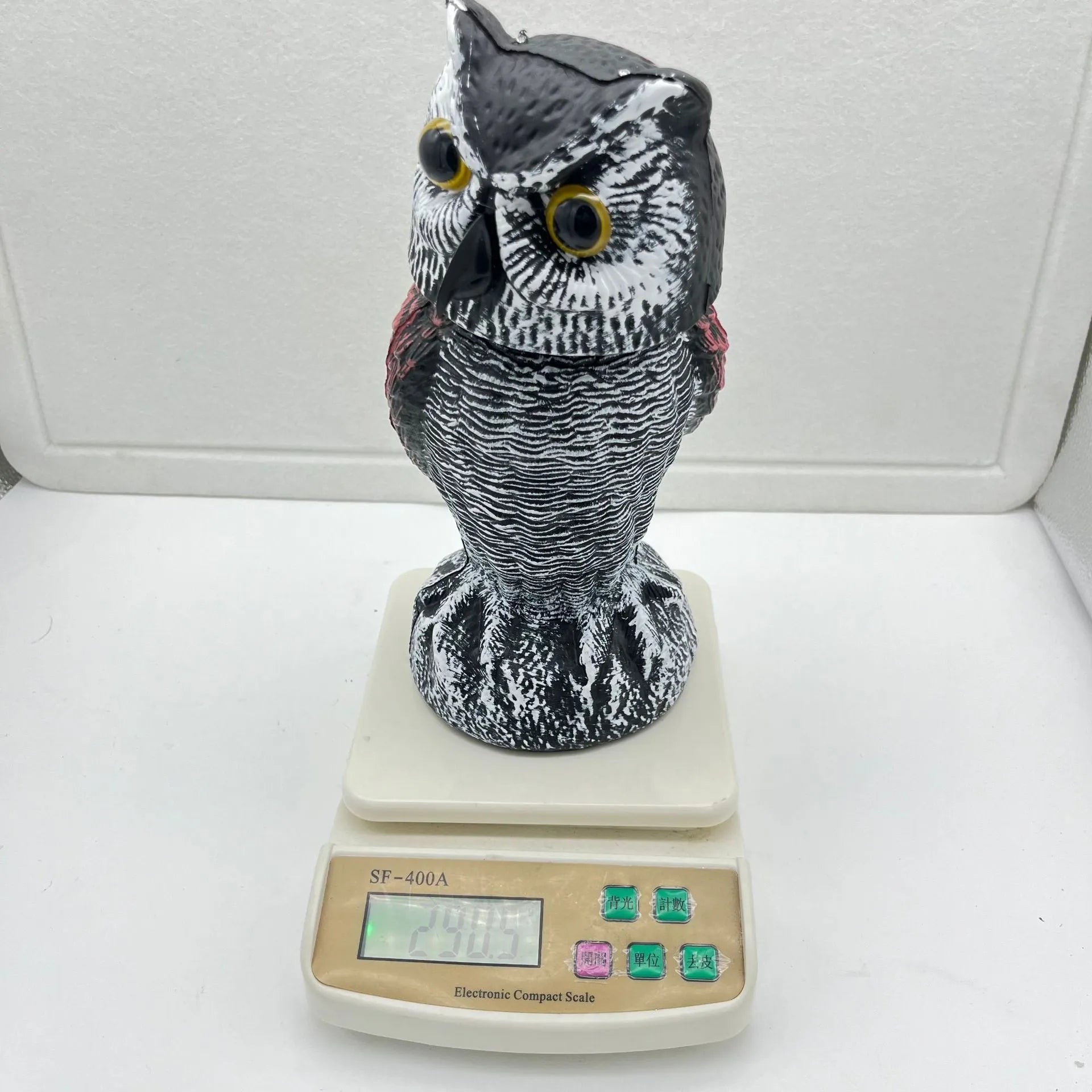 Artificial owl bird scarer ornament with movable head for outdoor garden pest control