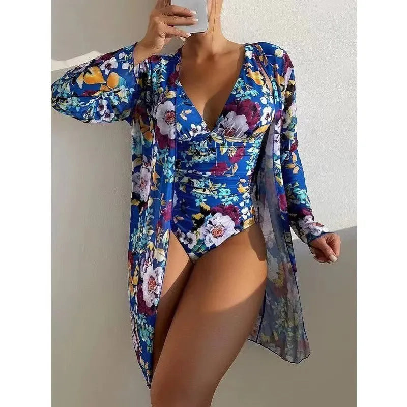 Women's floral patterned bikini and matching coat swimwear set in one of seven available colours.