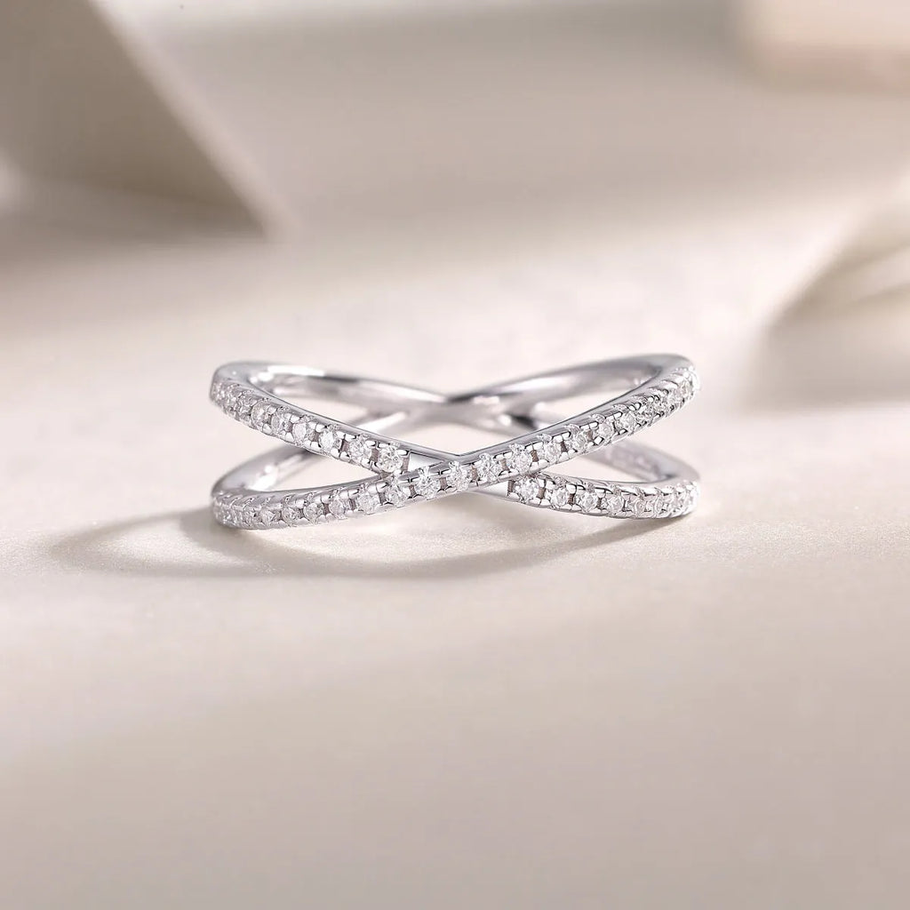 Love Interwoven moissanite wedding ring set in gold S925 silver with platinum plating on white background