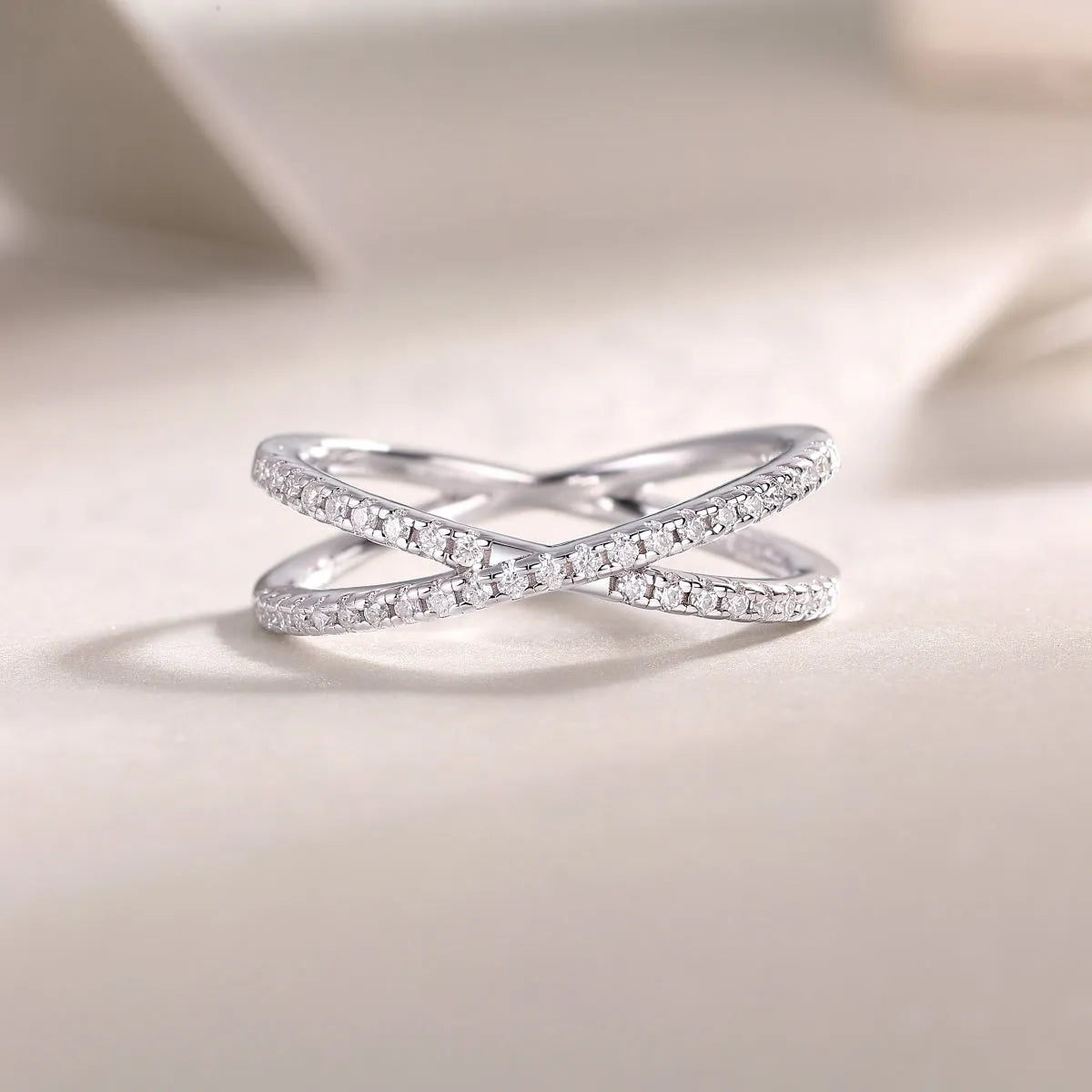 Love Interwoven moissanite wedding ring set in gold S925 silver with platinum plating on white background
