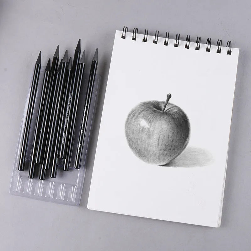 Set of six graphite pencils and three carbonized drawing pencils with wooden casings on a blister card.