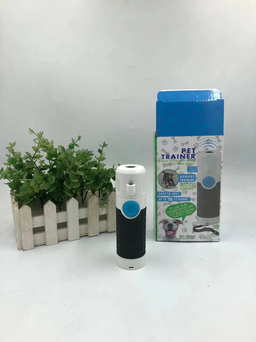 White ABS plastic handheld ultrasonic dog trainer for barking control