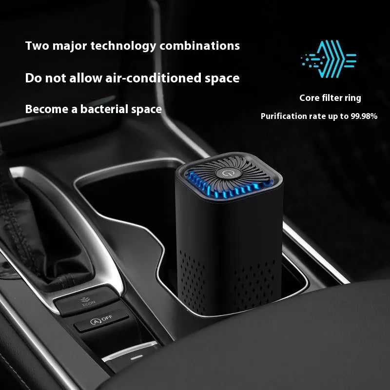 Mini USB-powered car air purifier in black and white colour options for removing smoke and dust in small spaces.