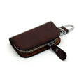 Black genuine leather car key case with a silver V-shaped zipper closed.