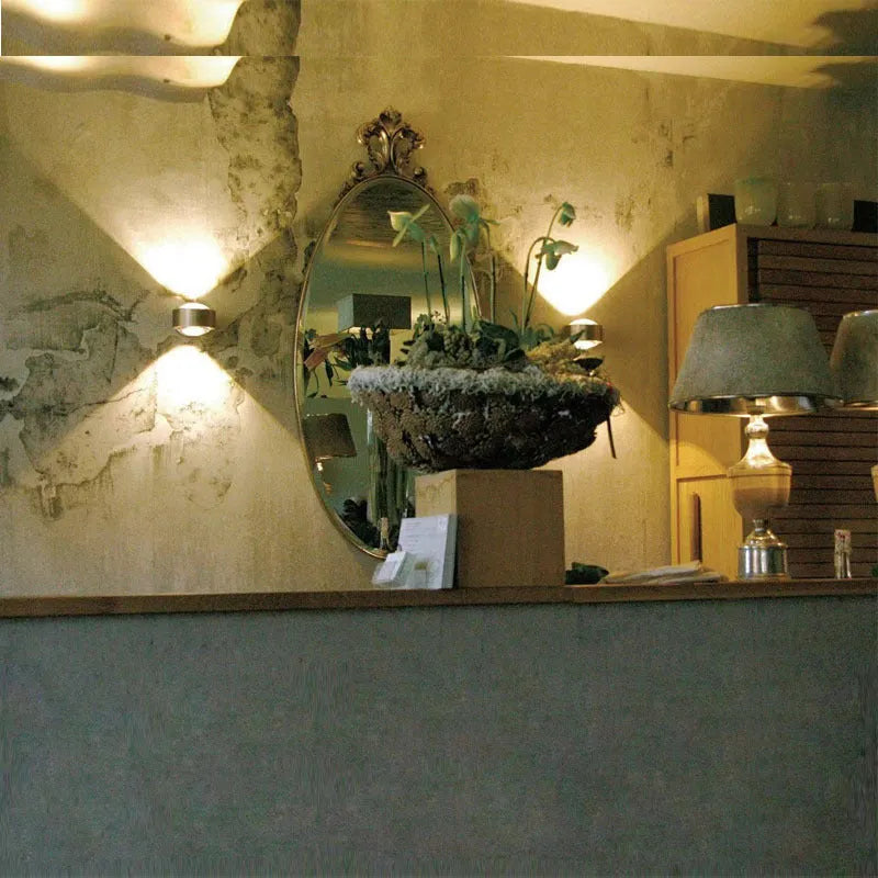 Modern small wall lamp with chrome, gold, black, and white finish options for bedside, hallway, staircase, or hotel use.