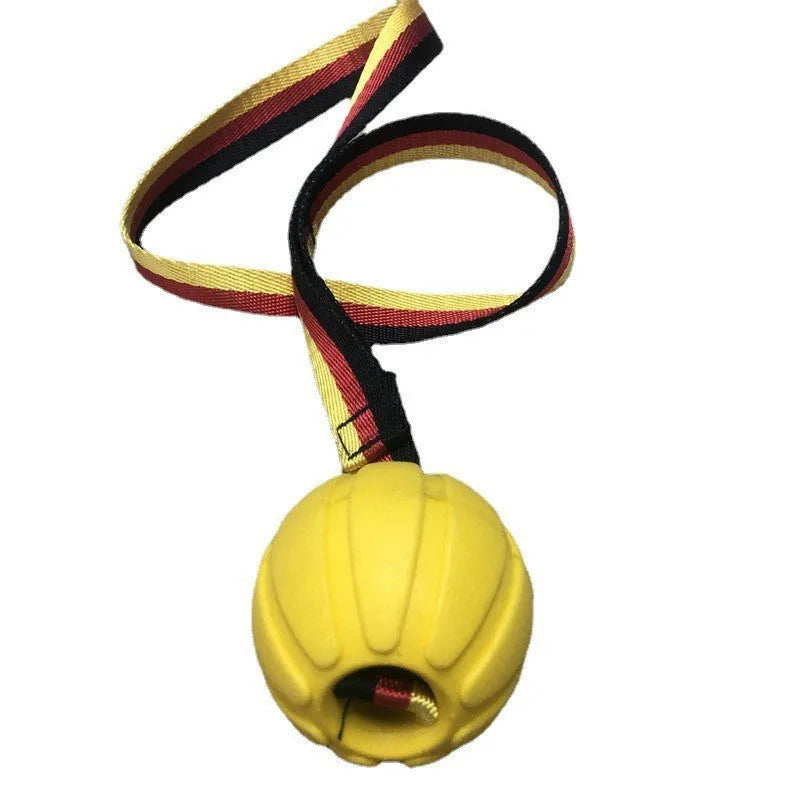 Yellow and camouflage coloured EVA floating dog balls with strings in 6.5cm, 7cm, and 9cm sizes.