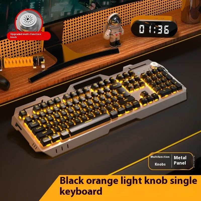 Aluminium mechanical gaming keyboard with rotary knob, shown in metal grey with rainbow backlighting.